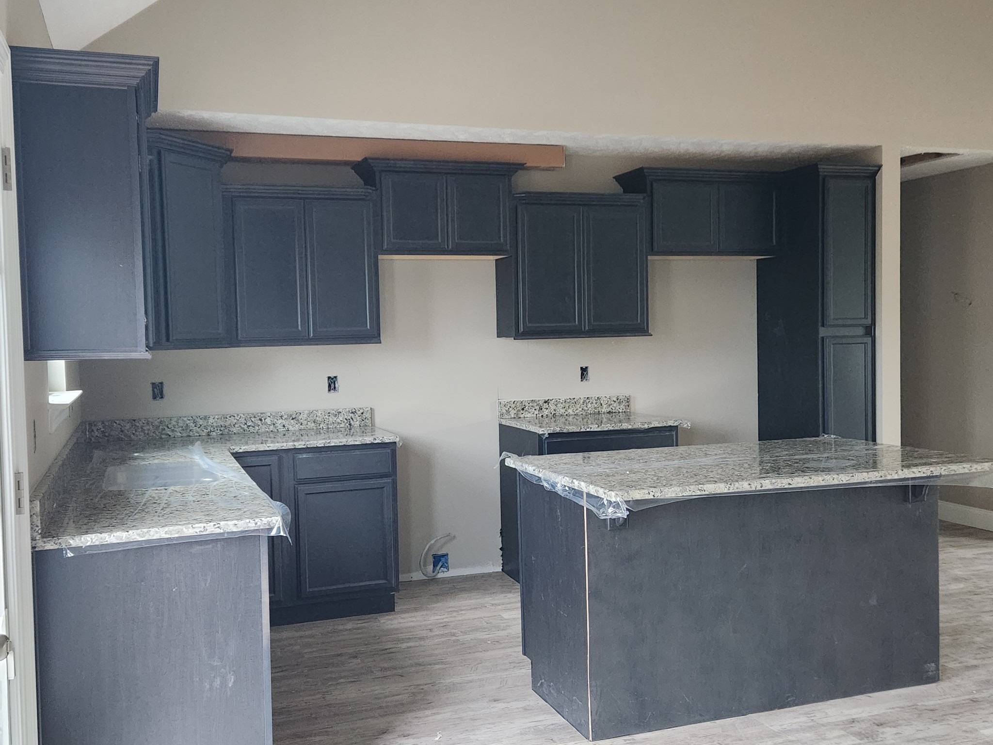 2859 Upstream Road Christiana, TN 37037 - Photo 65 of 72 a kitchen with granite countertop a sink stove and cabinets
