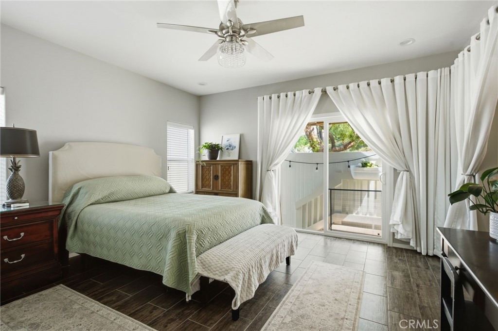 1051 Site, Unit 21 Brea, CA 92821 - Photo 15 of 25 Master Bedroom with Sliding Door to Backyard