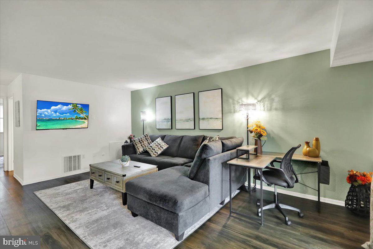 9 A Fairway Road Reading, PA 19607 - Photo 6 of 22 a living room with furniture and a wooden floor
