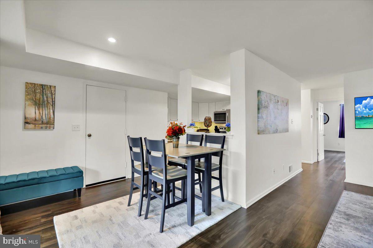 9 A Fairway Road Reading, PA 19607 - Photo 7 of 22 a view of a dining room with furniture and wooden floor