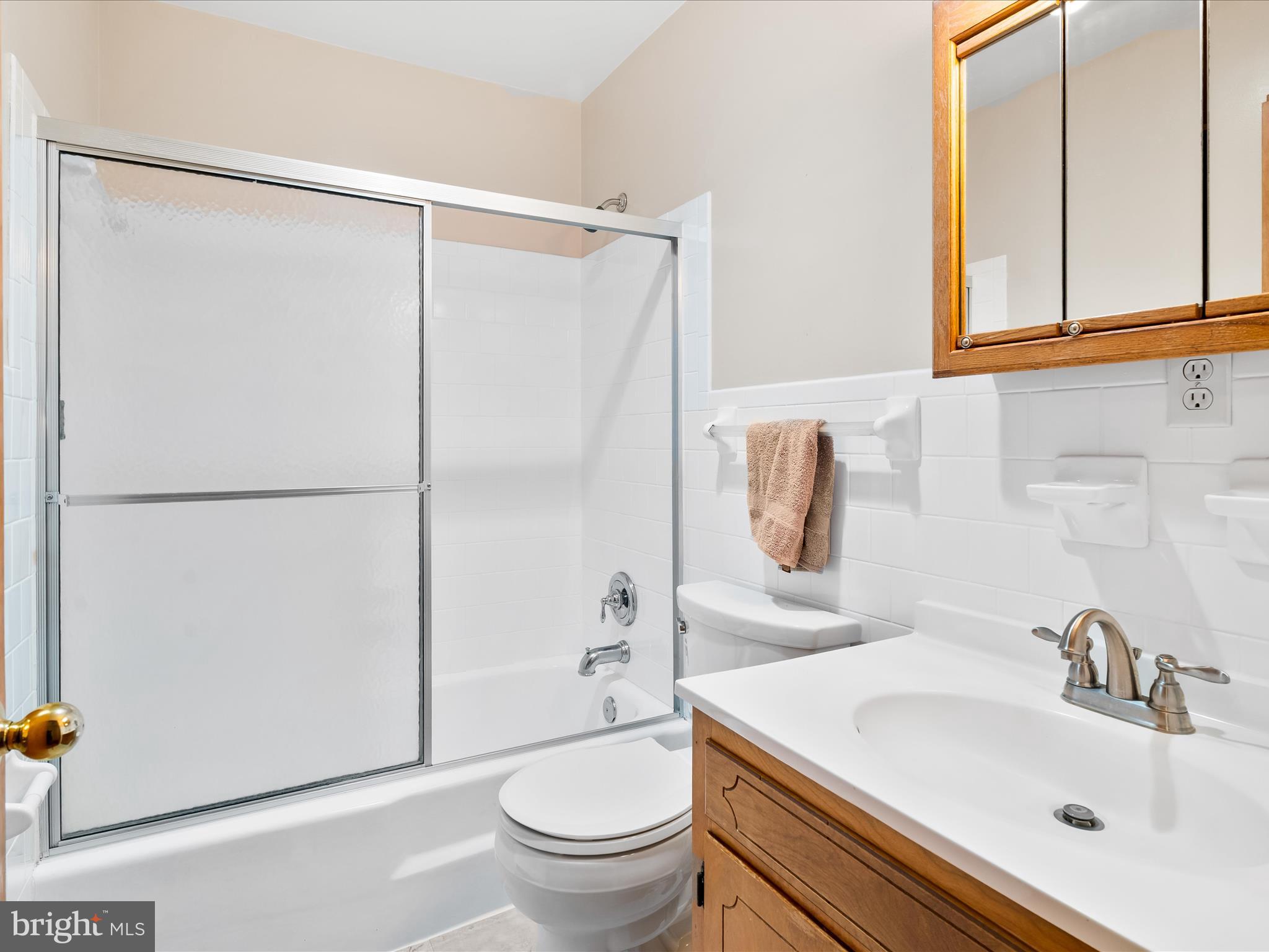7429 Lewistown Road Thurmont, MD 21788 - Photo 32 of 68 a bathroom with a sink toilet and shower