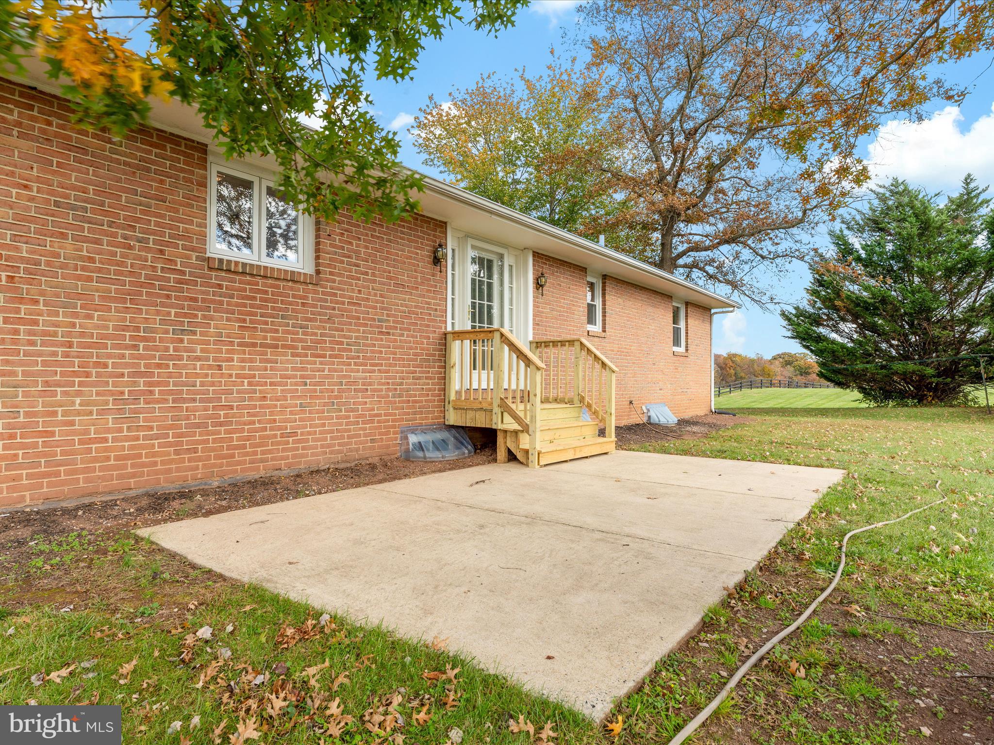 7429 Lewistown Road Thurmont, MD 21788 - Photo 41 of 68 a view of a house with a backyard and a tree