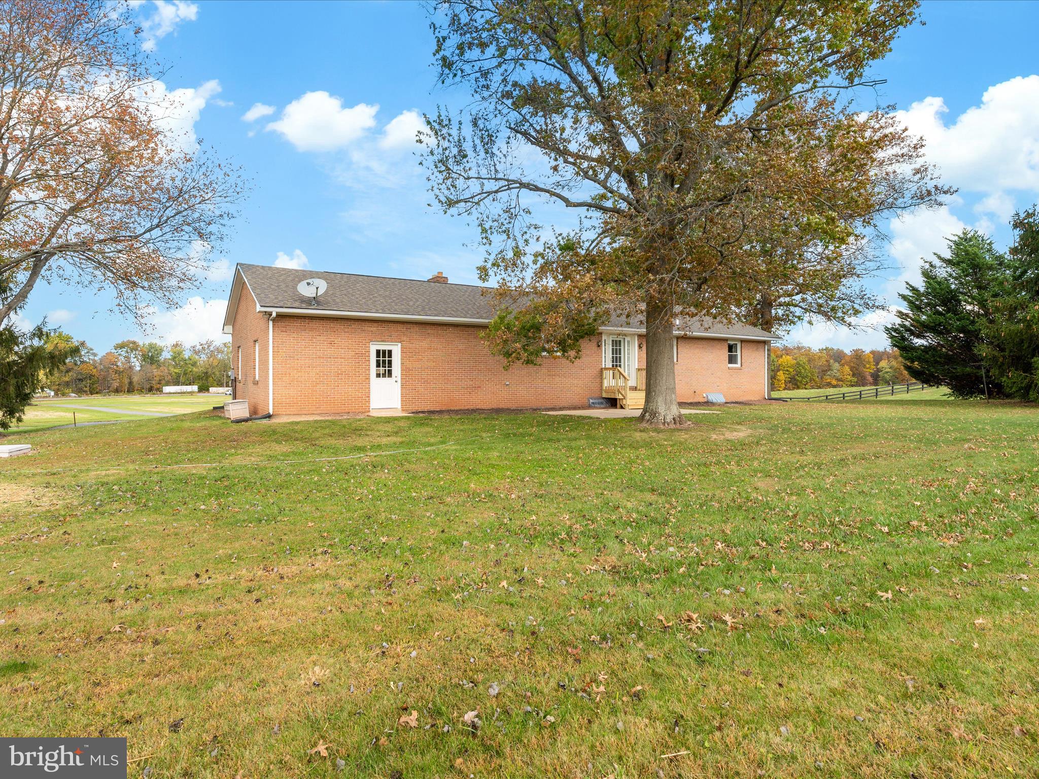 7429 Lewistown Road Thurmont, MD 21788 - Photo 43 of 68 a house view with swimming pool in front of it
