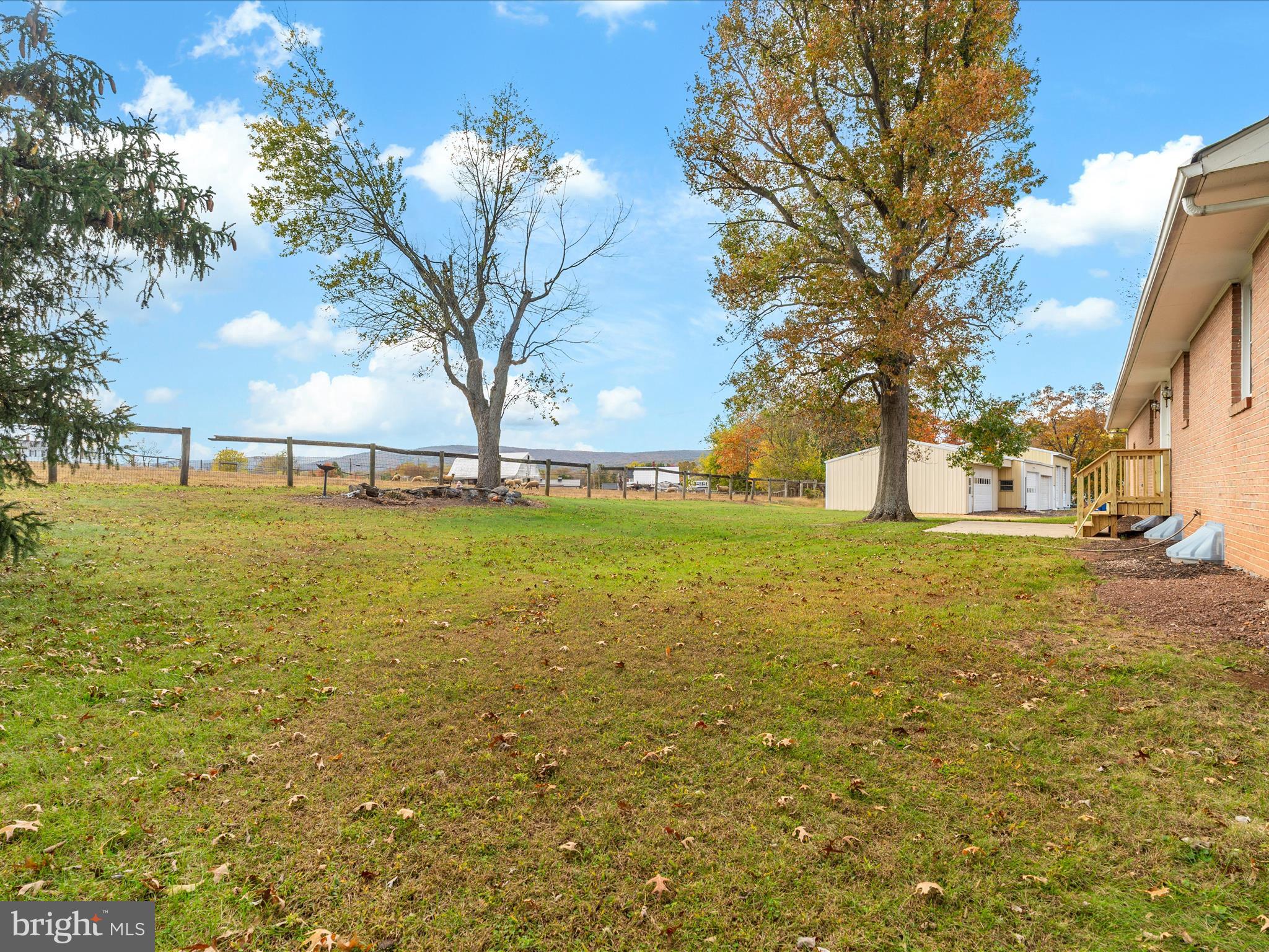 7429 Lewistown Road Thurmont, MD 21788 - Photo 46 of 68 a view of yard with swimming pool and green space