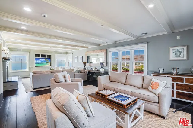 a view of a hallway with seating area