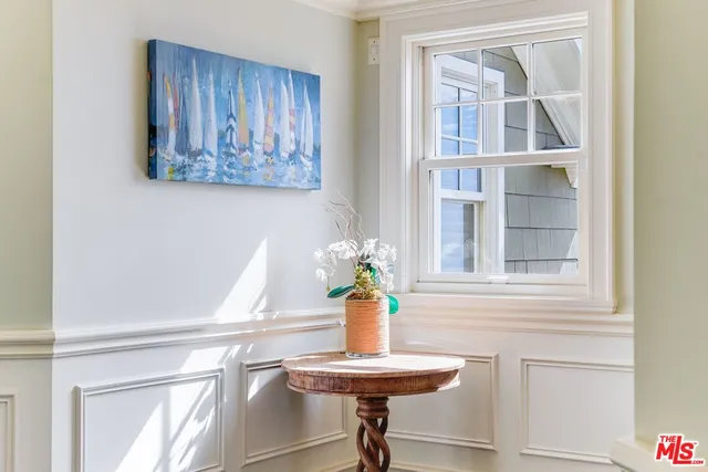 a bathroom with a sink and a window