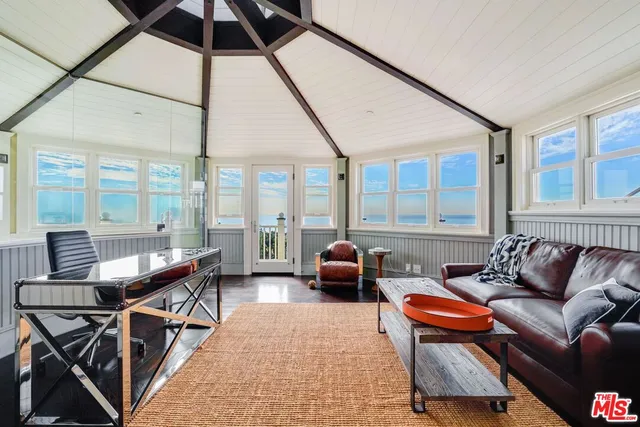 a view of a swimming pool with a lounge chairs