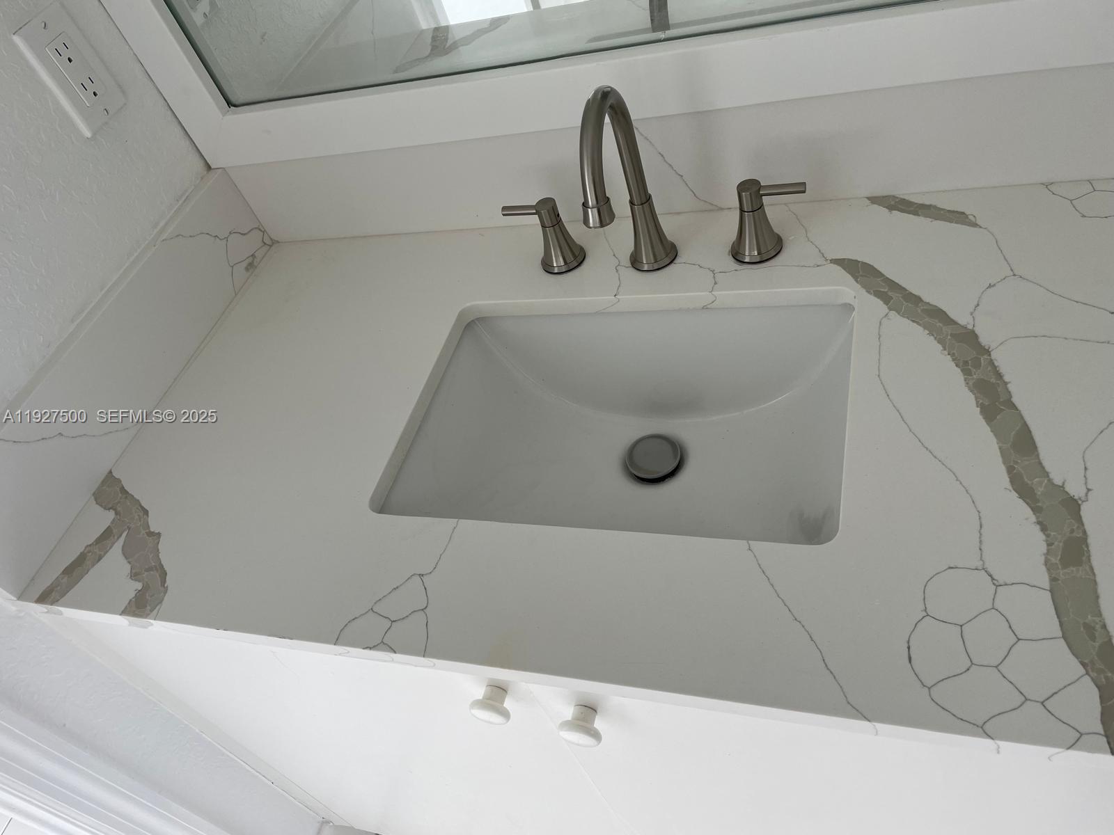 15964 Southwest 139th Street Miami, FL 33196 - Photo 19 of 22 a bathroom with a sink