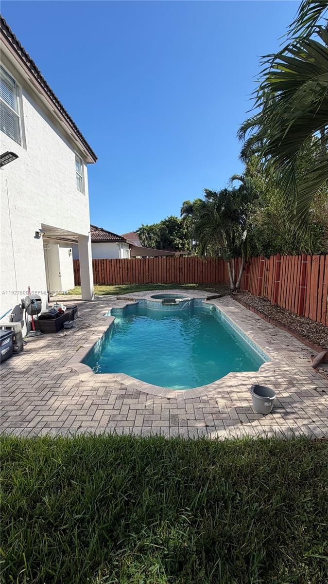 15964 Southwest 139th Street Miami, FL 33196 - Photo 22 of 22 a view of a house with a yard