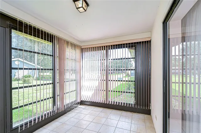 a view of a room with windows