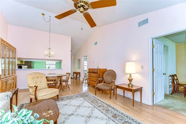 a bedroom with two beds and a window