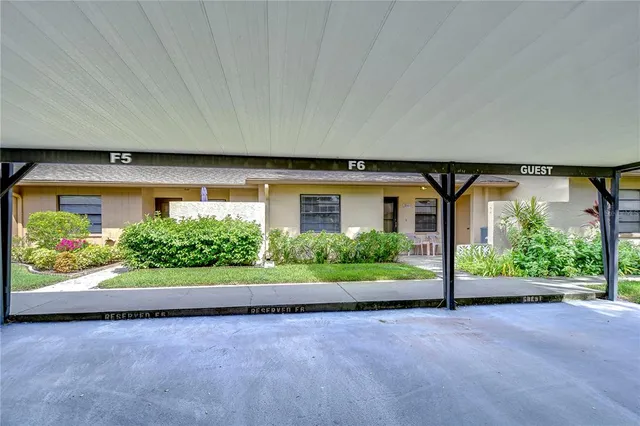 a view of a house with a garden