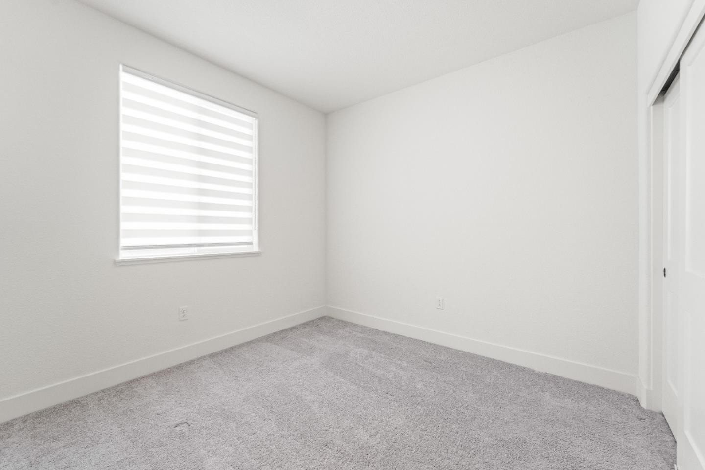 384 Ramos Ranch Road Oakley, CA 94561 - Photo 33 of 39 an empty room with a window