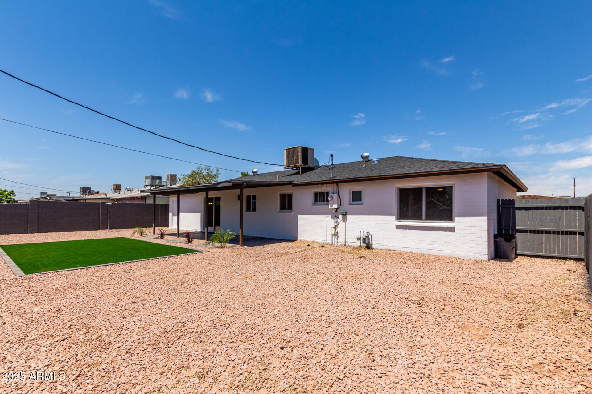 1539 West 5th Street Tempe, AZ 85281 - Photo 12 of 12 a front view of a house with a yard and garage