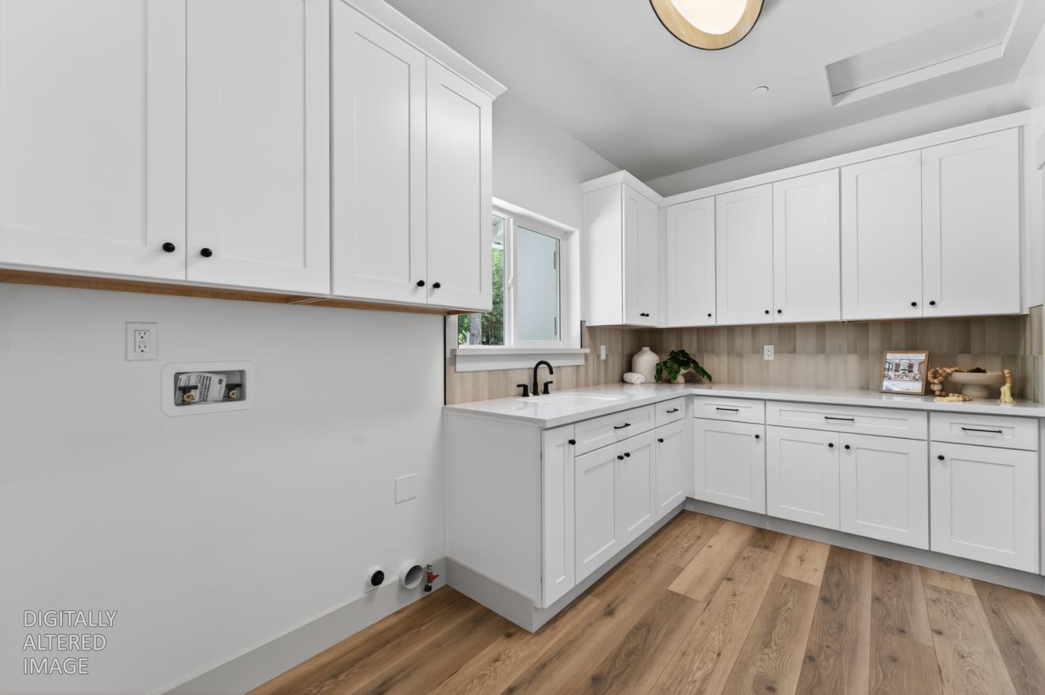 280 Jan Road Grass Valley, CA 95945 - Photo 22 of 66 a kitchen with granite countertop white cabinets and white appliances