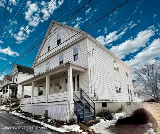 a view of a house with a patio