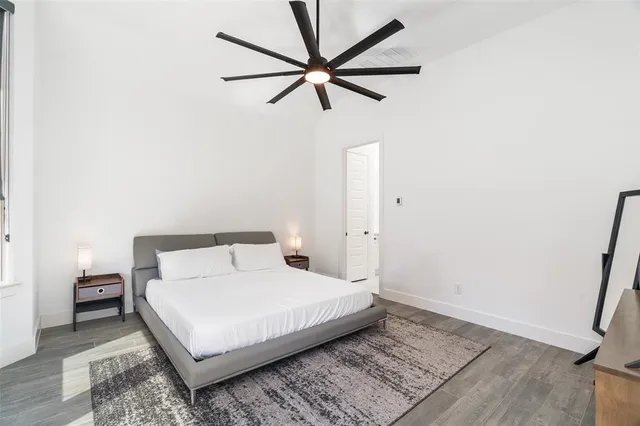 a view of a room with wooden floor and sink