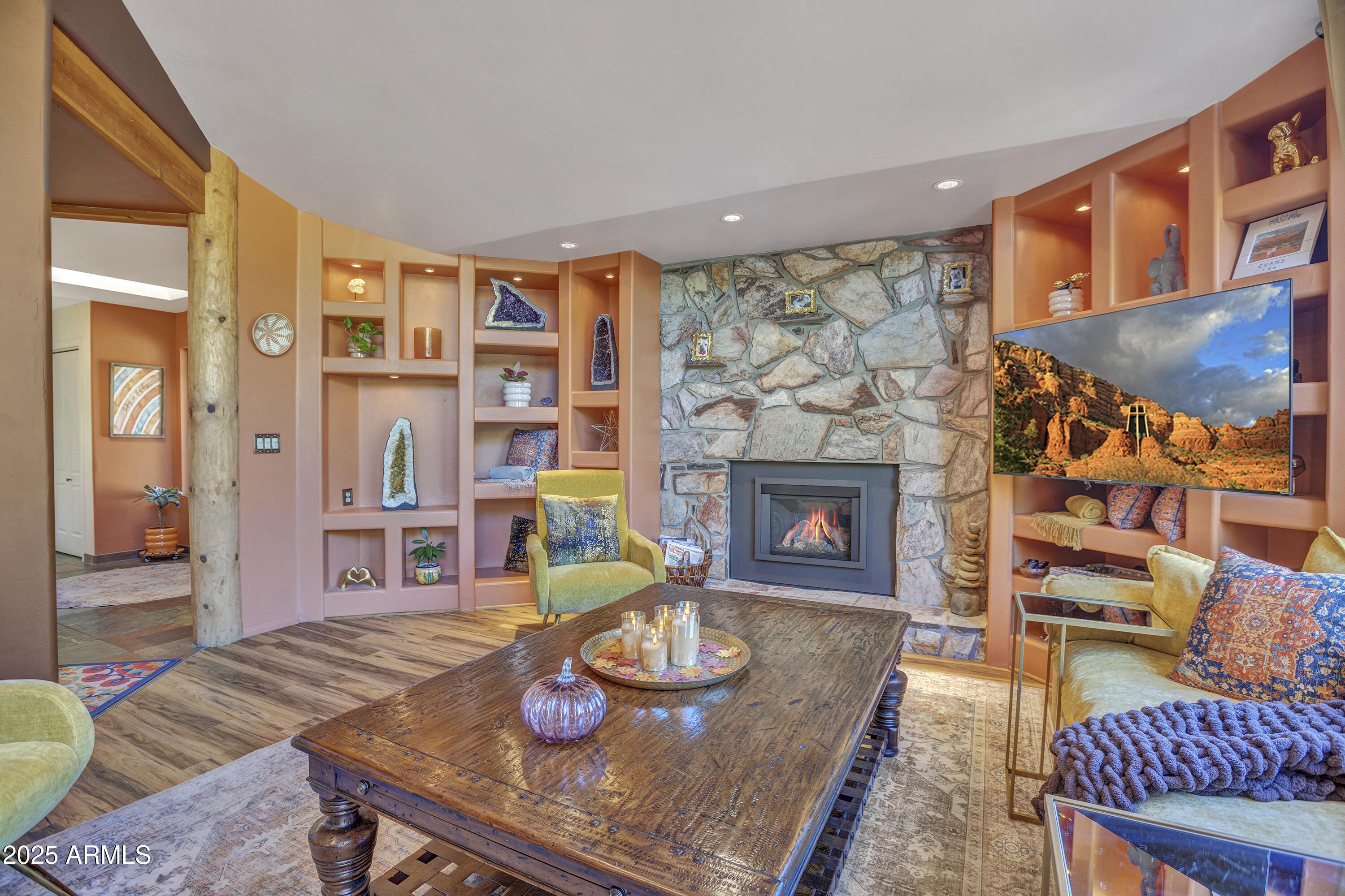 30 Box Canyon Road Sedona, AZ 86351 - Photo 10 of 30 a living room with furniture and a fireplace