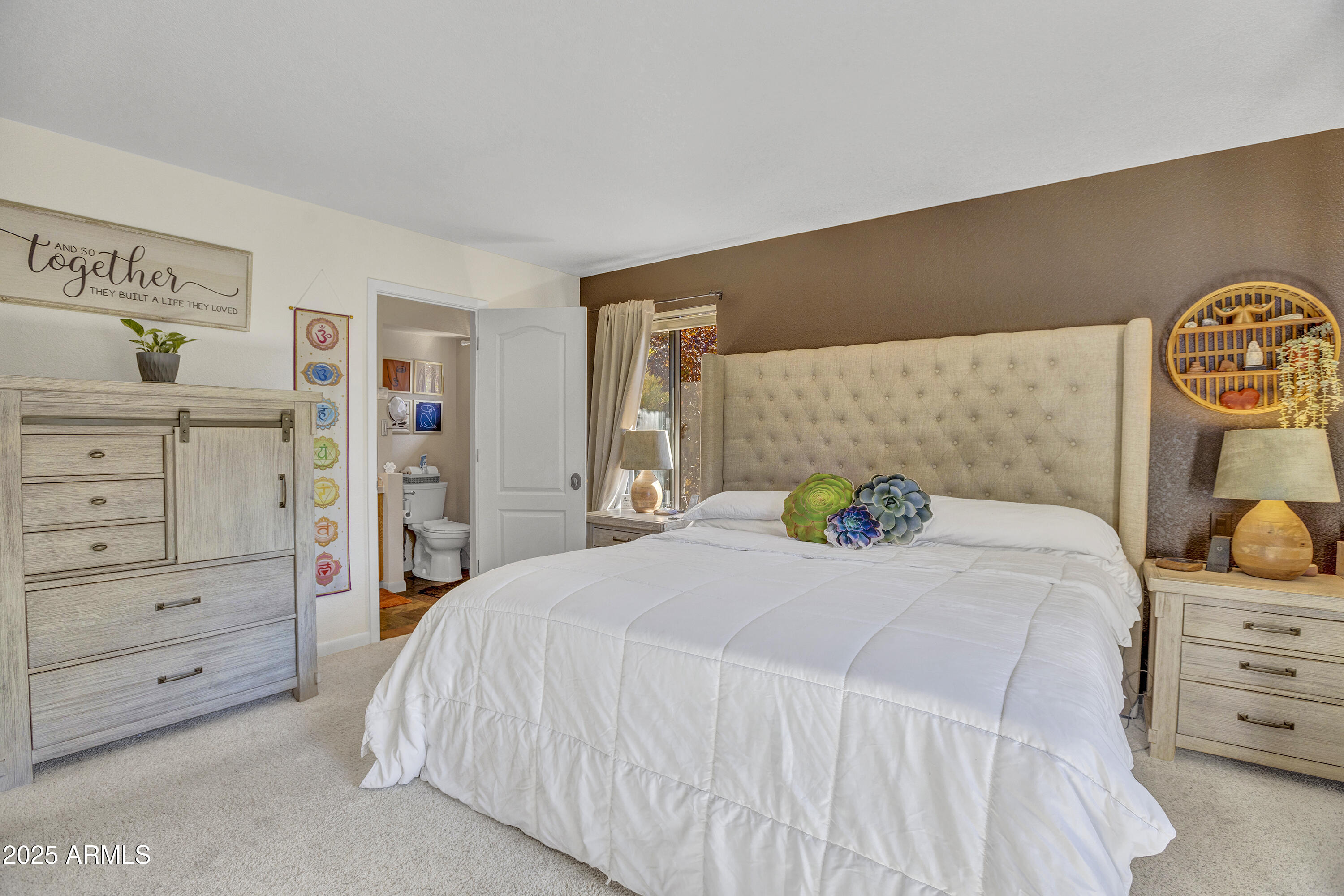 30 Box Canyon Road Sedona, AZ 86351 - Photo 17 of 30 a bedroom with a bed and a dresser