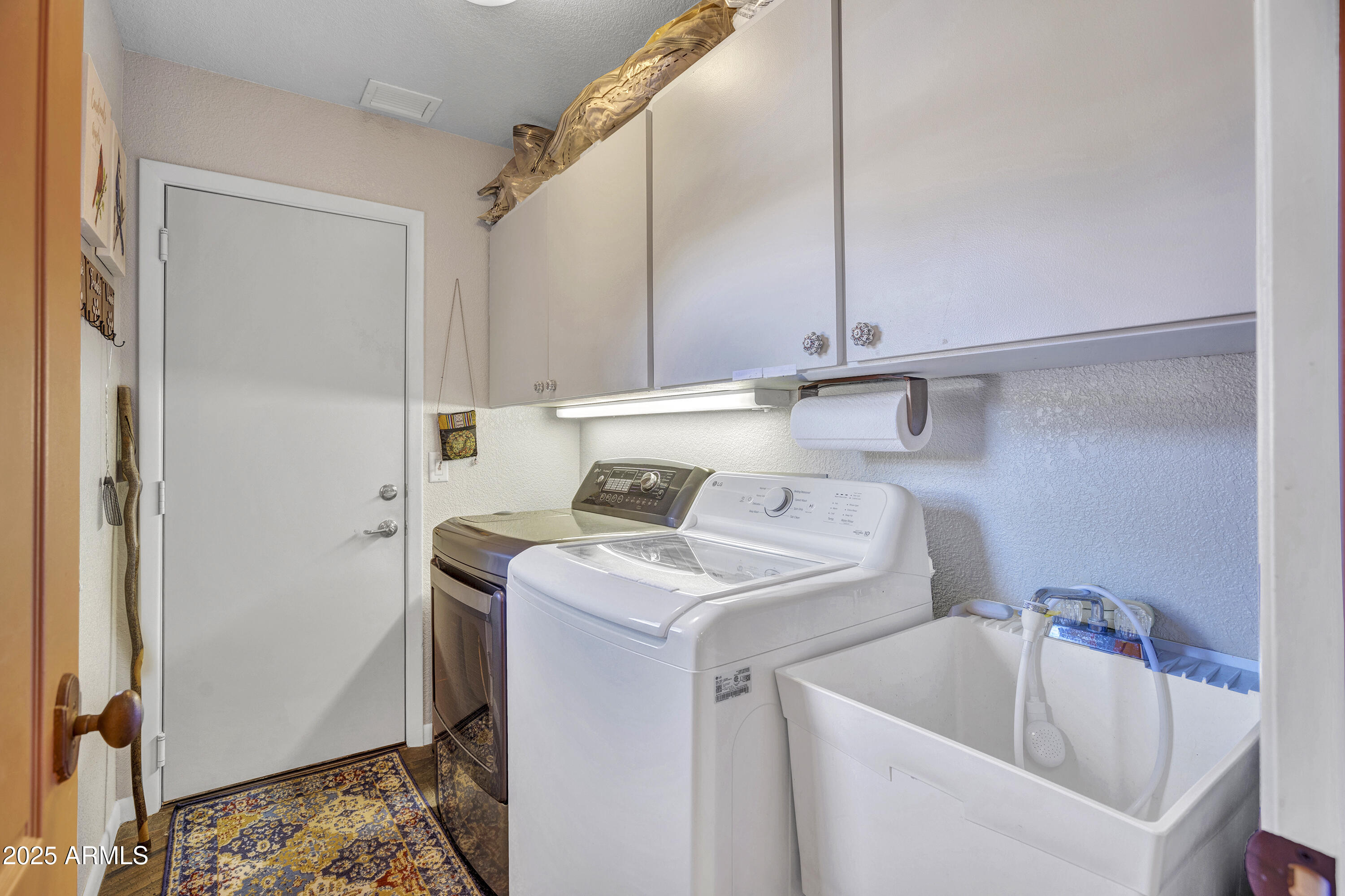 30 Box Canyon Road Sedona, AZ 86351 - Photo 22 of 30 a utility room with dryer and washer