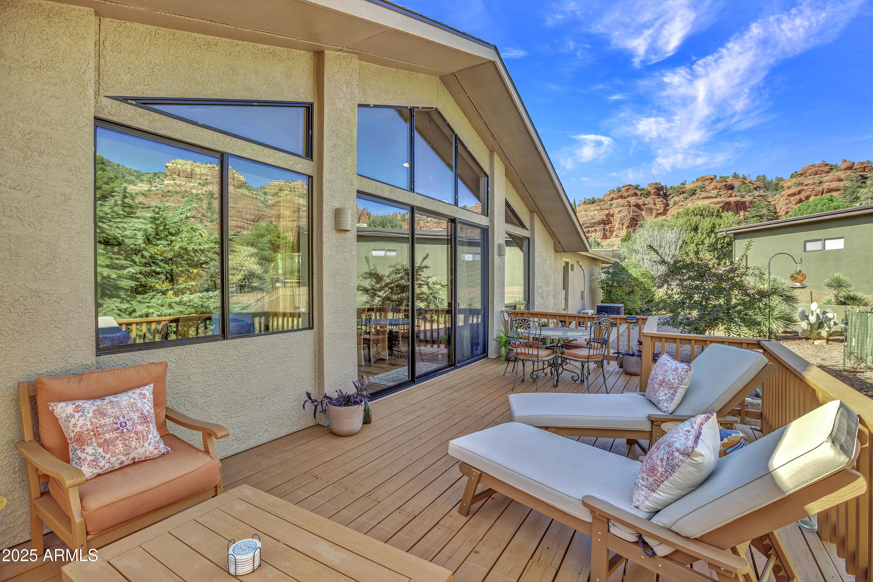 30 Box Canyon Road Sedona, AZ 86351 - Photo 24 of 30 a outdoor space with patio the couches and dining table with garden view