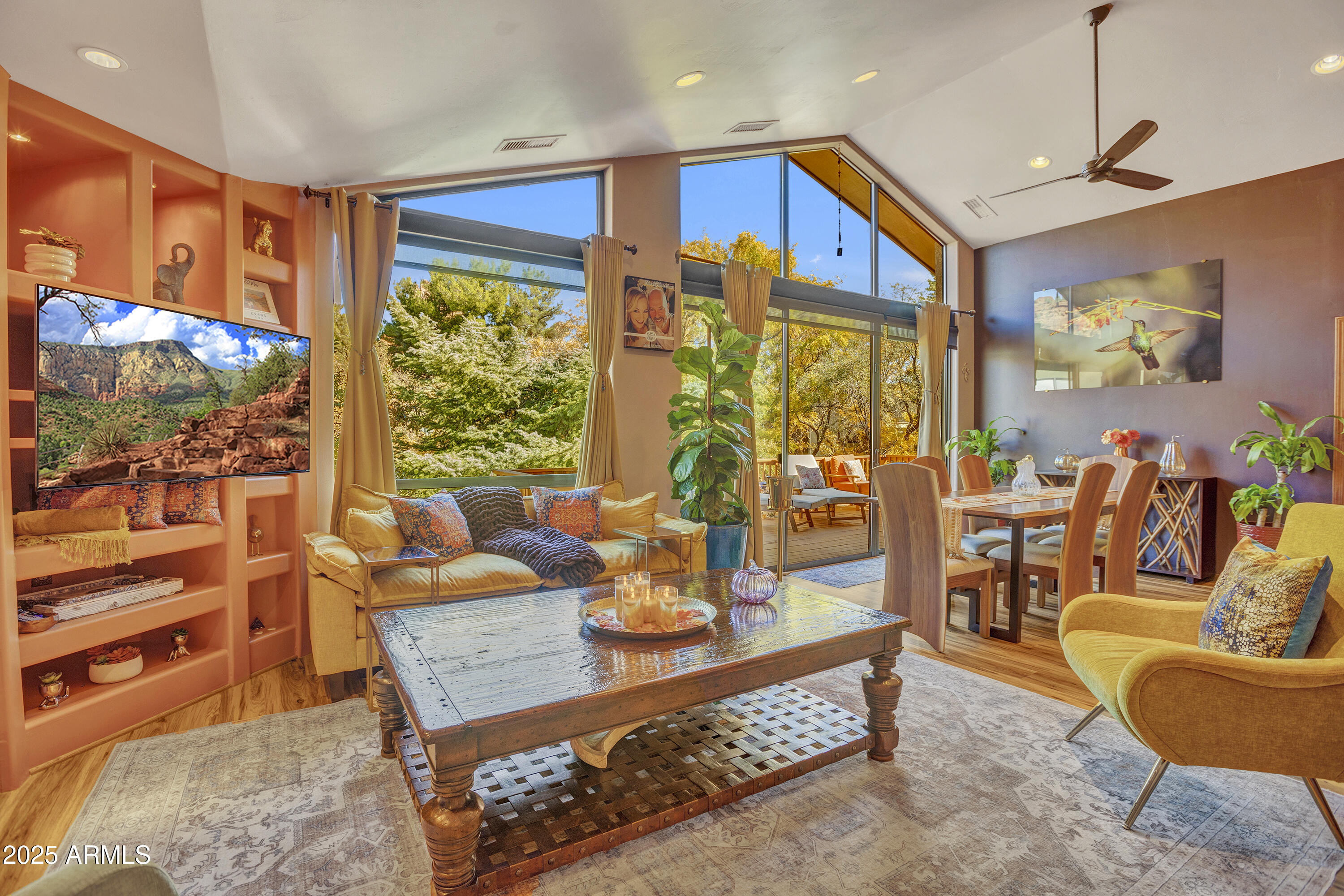 30 Box Canyon Road Sedona, AZ 86351 - Photo 2 of 30 a living room with patio furniture and a large window