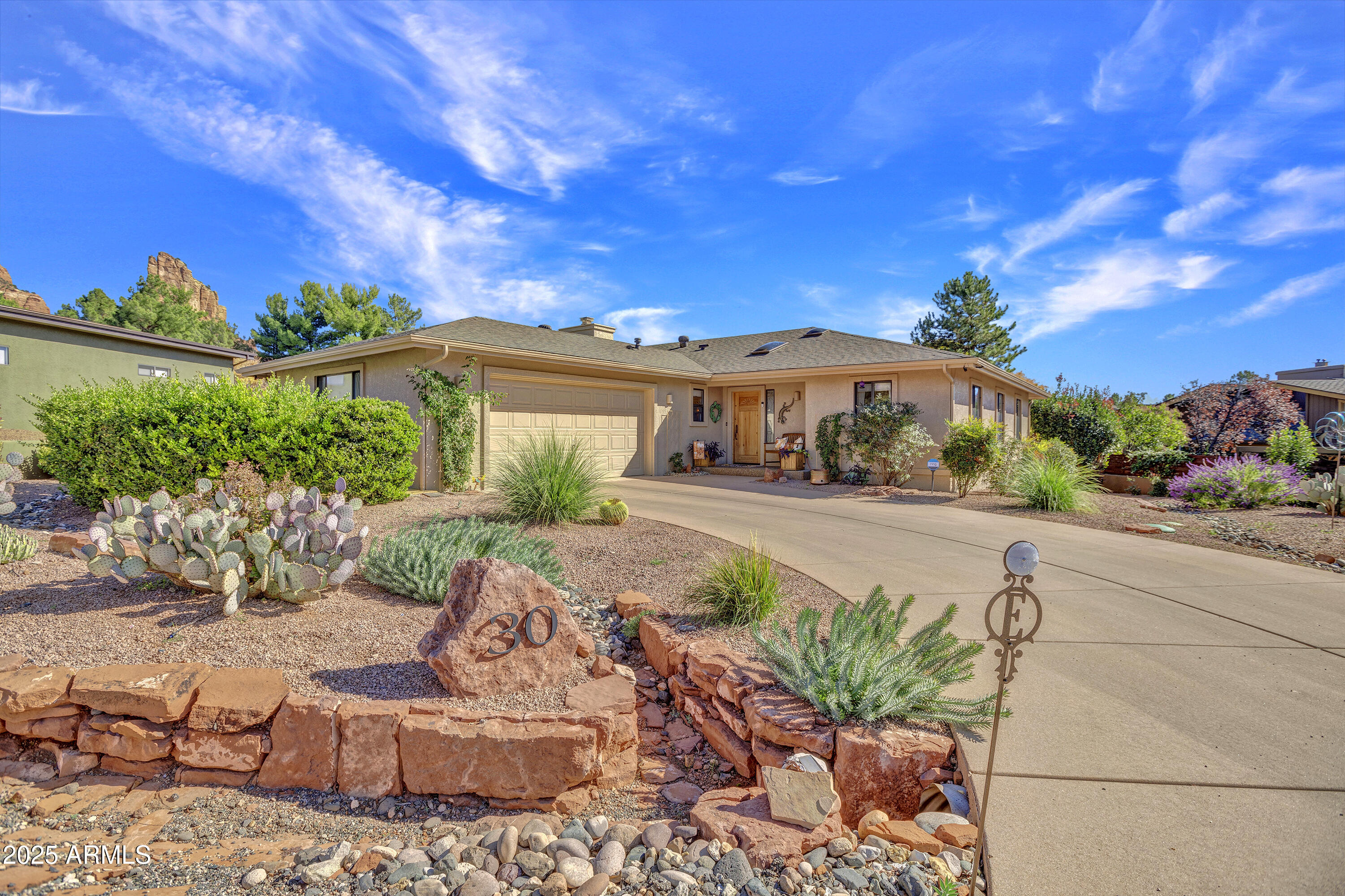 30 Box Canyon Road Sedona, AZ 86351 - Photo 3 of 30 a front view of a house with a yard