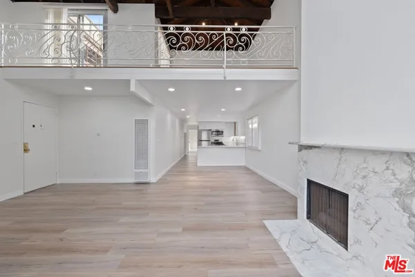 a view of kitchen and front door