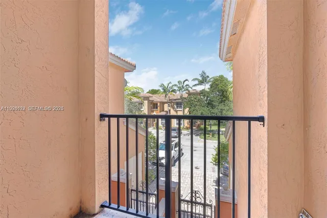 a bedroom with furniture and painting on the wall