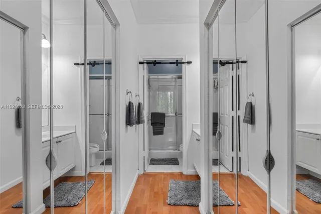 a bathroom with a sink and mirror