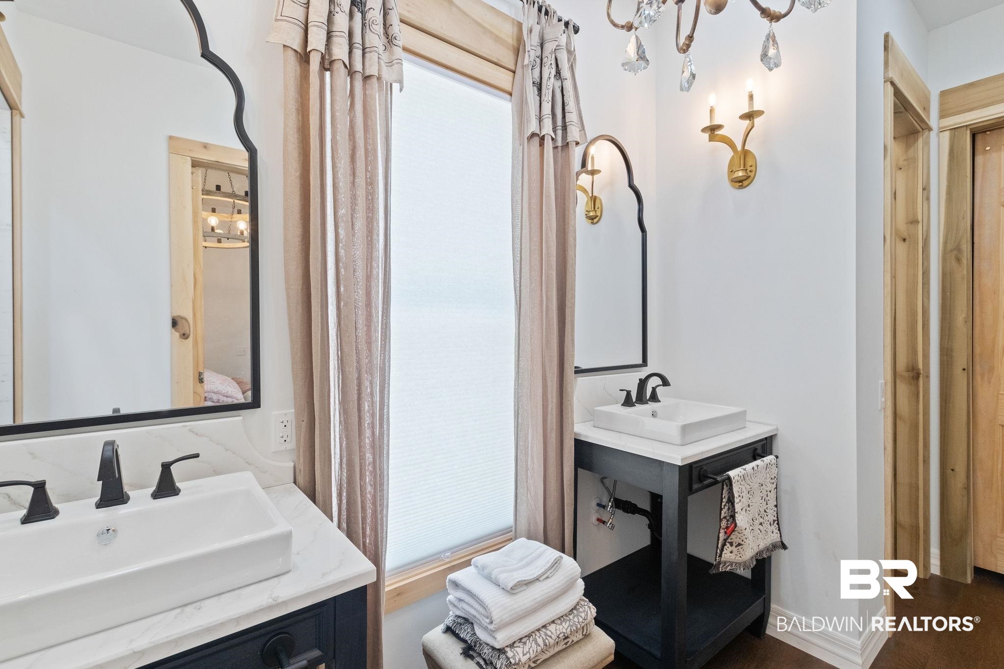 11855 Heather Dells Lane Foley, AL 36535 - Photo 25 of 48 Bathroom with double vanity and a chandelier