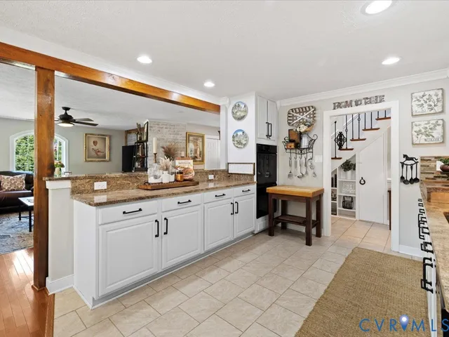 a spacious bathroom with a double vanity sink and a mirror