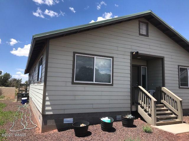242 County Road Concho, AZ 85924 - Photo 1 of 28 a front view of house along with street