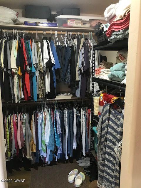 242 County Road Concho, AZ 85924 - Photo 20 of 28 a view of walk in closet with clothes