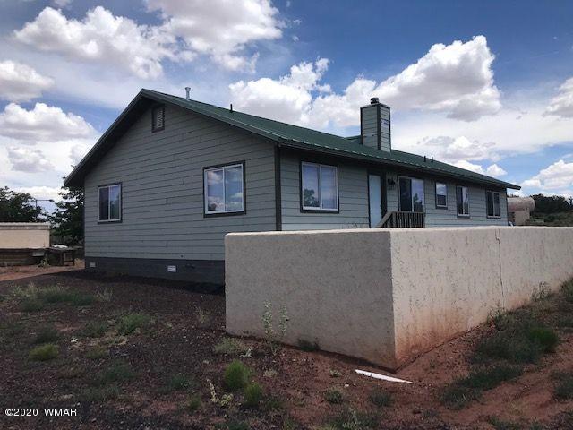242 County Road Concho, AZ 85924 - Photo 3 of 28 a view of a house with a yard