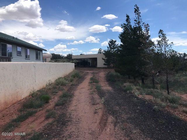 242 County Road Concho, AZ 85924 - Photo 4 of 28 a view of a house with a yard