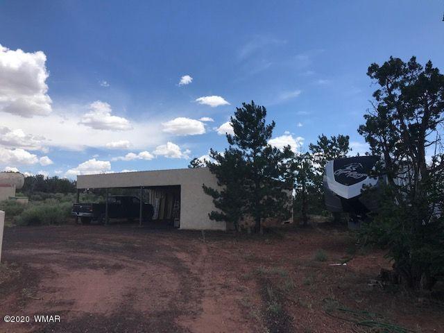 242 County Road Concho, AZ 85924 - Photo 5 of 28 a view of house with outdoor space and garden
