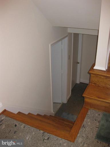 8455 Thames Street Springfield, VA 22151 - Photo 3 of 19 a view of entryway with wooden floor