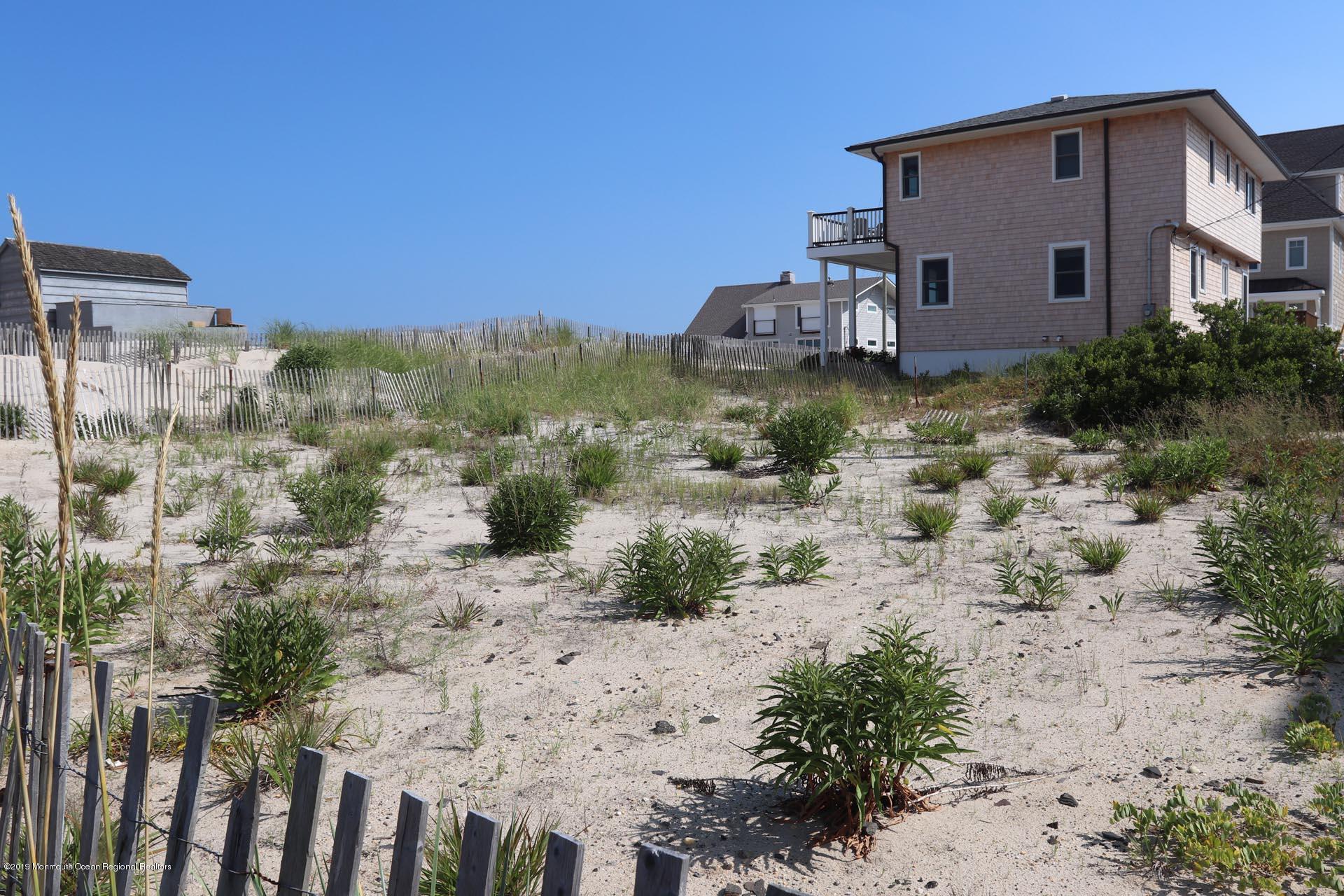 21 Silver Beach Road Lavallette, NJ 08735 - Photo 18 of 25 a house view with a garden space