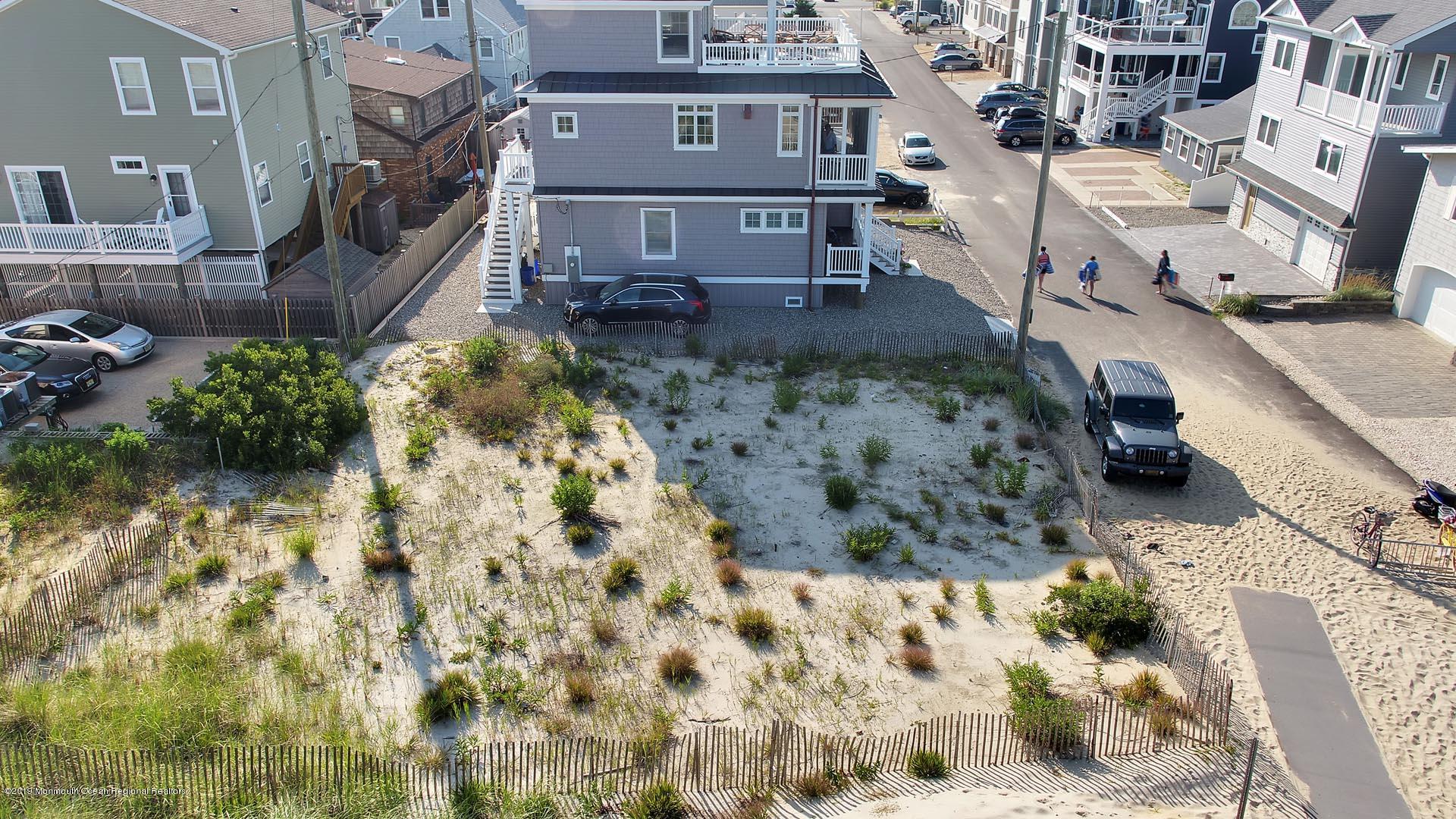 21 Silver Beach Road Lavallette, NJ 08735 - Photo 7 of 25 a view of a house with a yard