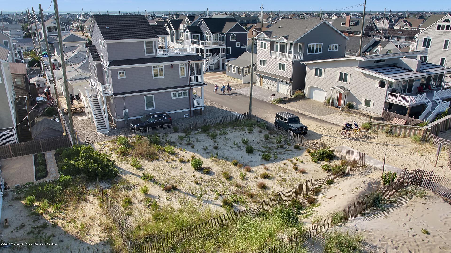 21 Silver Beach Road Lavallette, NJ 08735 - Photo 8 of 25 a view of a house with a yard