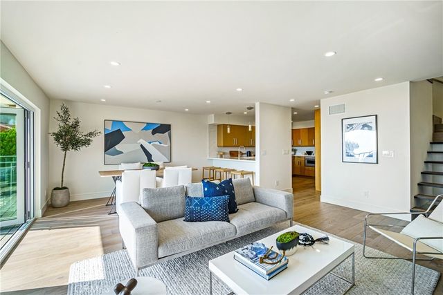 a bathroom with a sink double vanity granite and a mirror