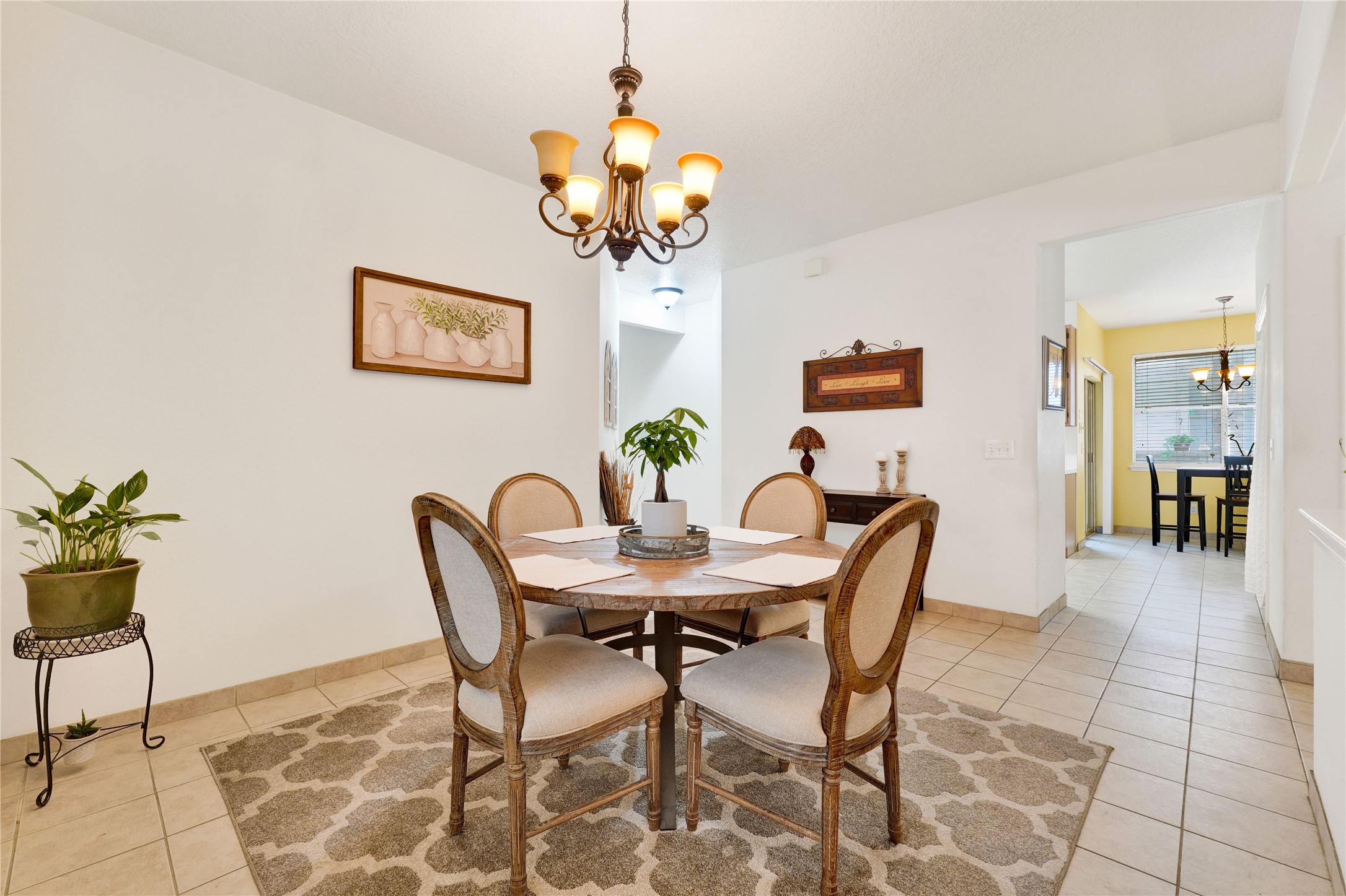 2923 Rising Sun Road Katy, TX 77449 - Photo 12 of 35 a view of a dining room with furniture and chandelier