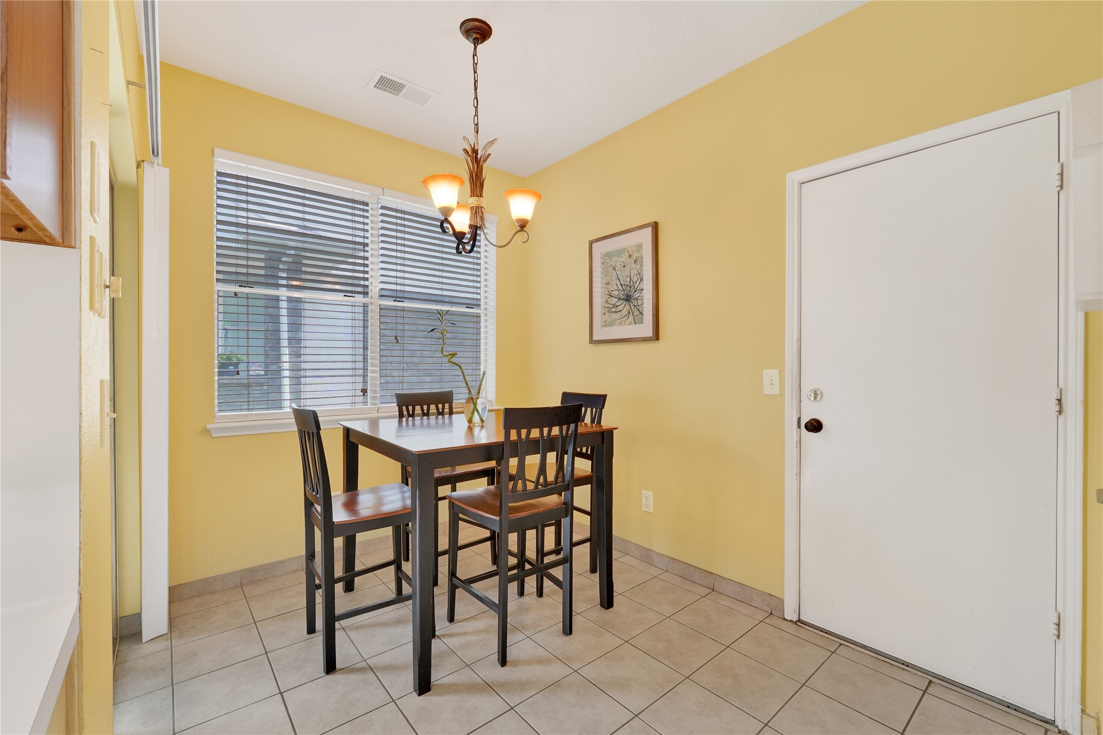2923 Rising Sun Road Katy, TX 77449 - Photo 16 of 35 a view of a dining room with furniture and chandelier