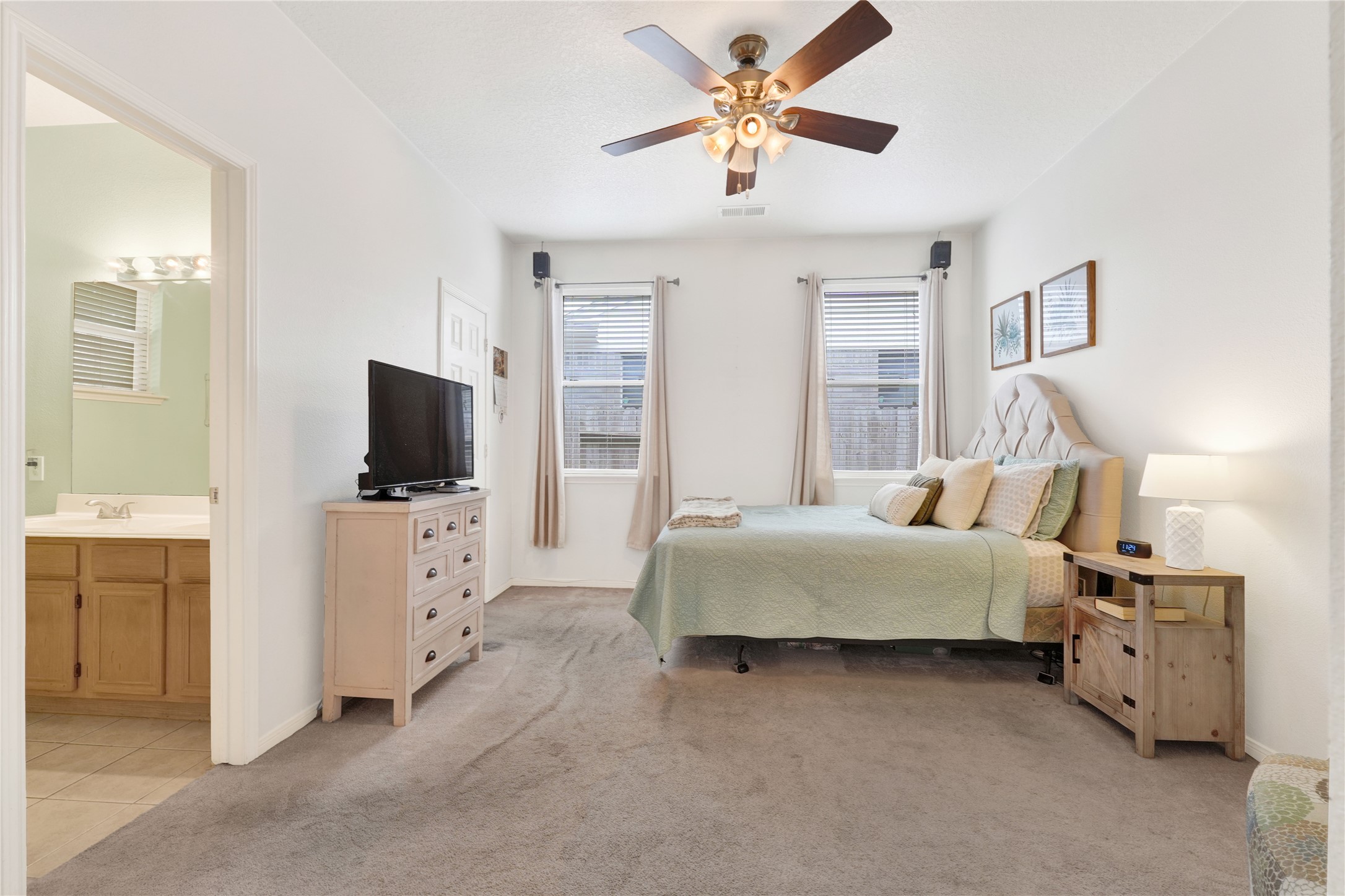 2923 Rising Sun Road Katy, TX 77449 - Photo 19 of 35 a living room with furniture and a flat screen tv
