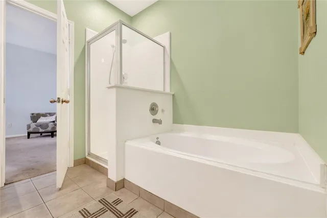 a bathroom with a bathtub and a sink