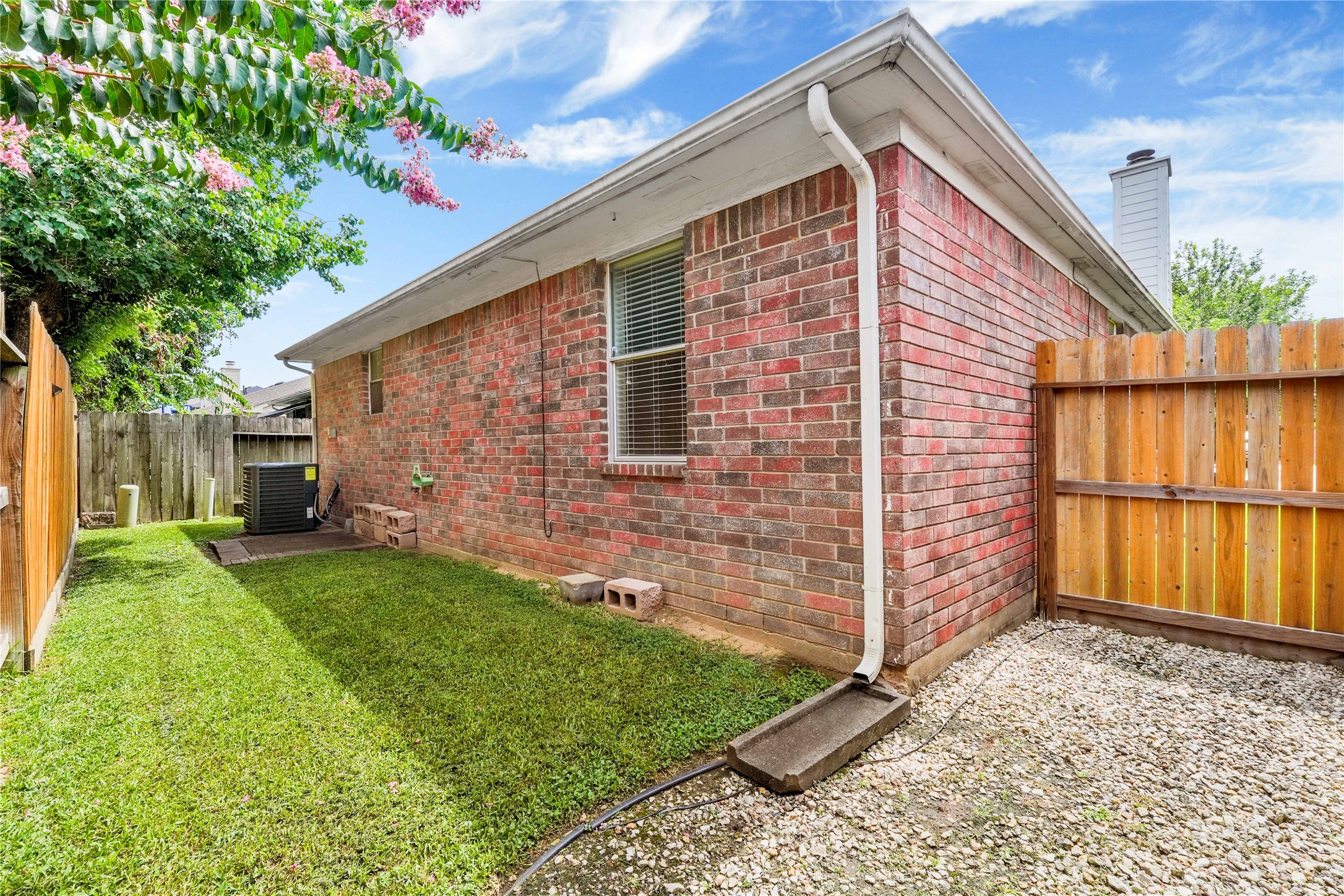 2923 Rising Sun Road Katy, TX 77449 - Photo 30 of 35 a view of backyard with potted plants