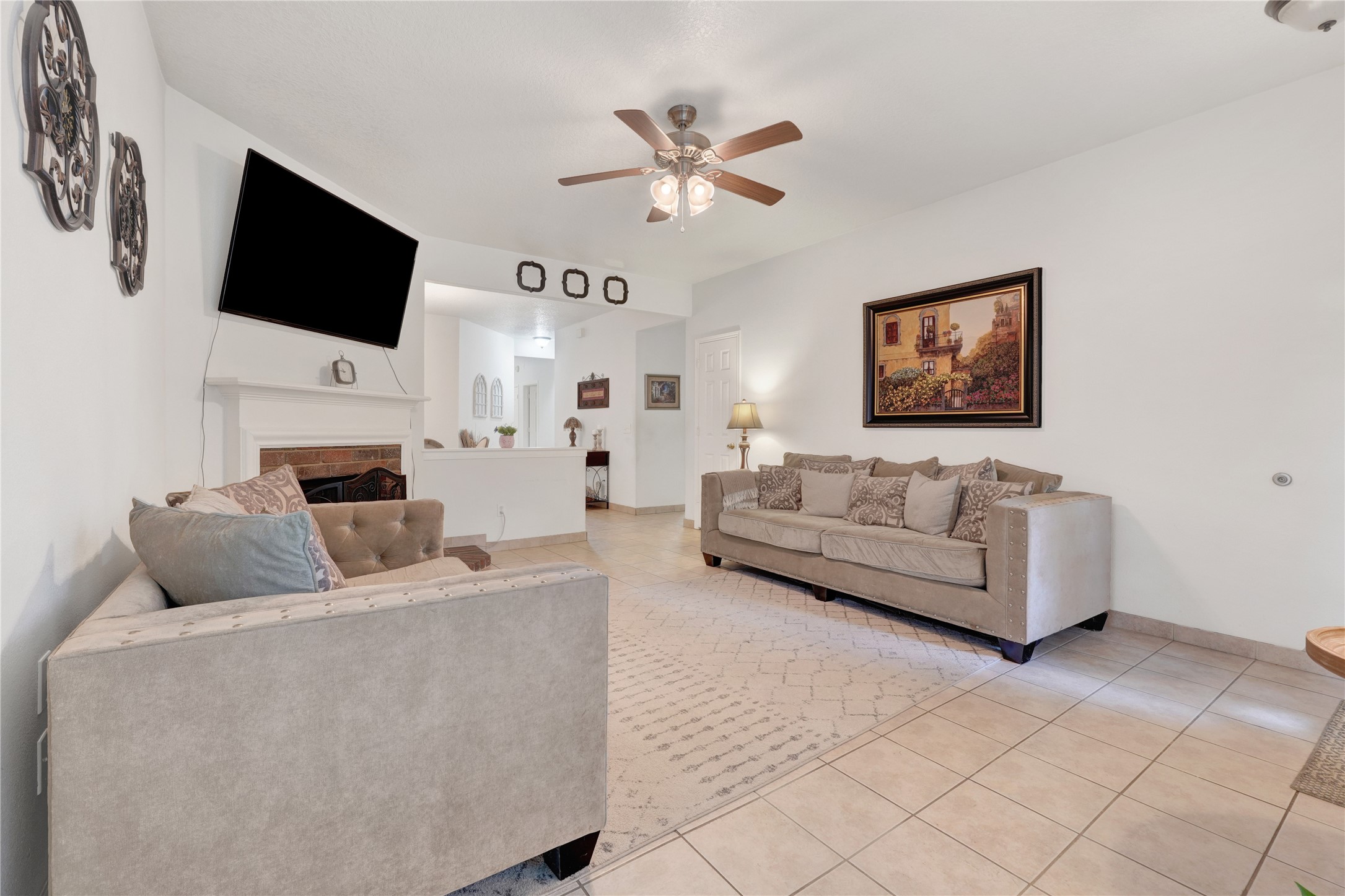 2923 Rising Sun Road Katy, TX 77449 - Photo 7 of 35 a living room with furniture and a flat screen tv