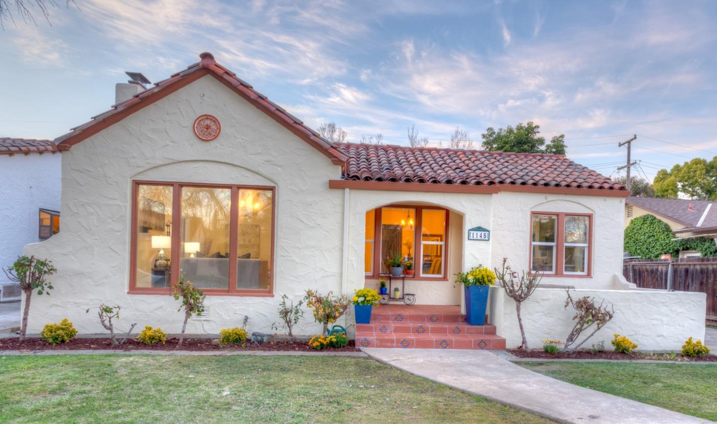 1145 Clark Way San Jose, CA 95125 - Photo 1 of 26 a front view of a house with garden
