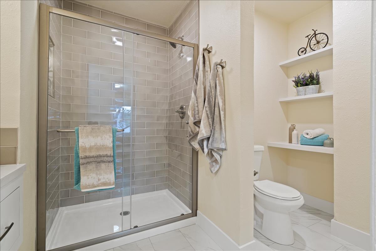 1145 Clark Way San Jose, CA 95125 - Photo 13 of 26 a bathroom with a shower a toilet and a sink